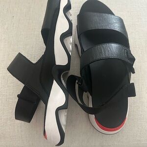 Sorel Sandals. Size 10.5. Black & White with touch of orange.